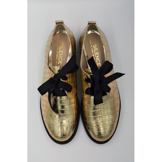Golden leather shoes